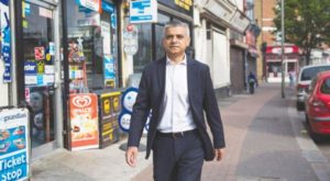 Sadiq Khan heading toward the City Hall in his first day for being London's Mayor on Monday.jpg
