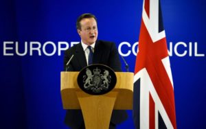 British Prime Minister David Cameron addresses the media after a European Union leaders summit in Brussels