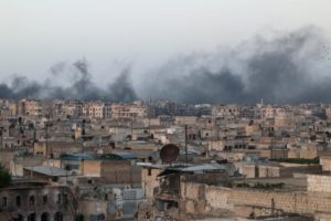 Smoke rises after airstrikes on the rebel-held al-Sakhour neighborhood of Aleppo