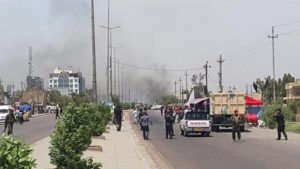 Smoke rises from a car bomb attack in the Saydiya district of southern Baghdad