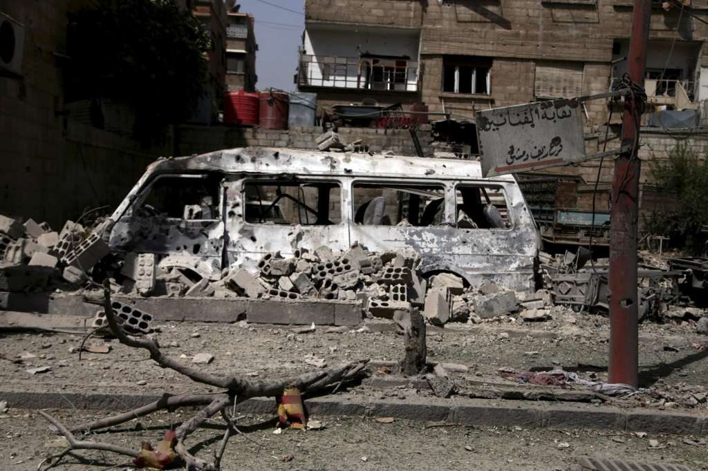 Monitor: More than 120 Dead in Multiple Blasts in Syria Regime Strongholds