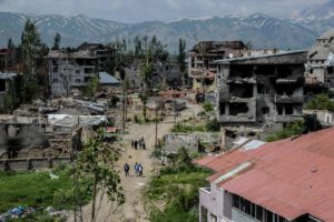 This file photo taken on May 30, 2016 shows a general view of damaged buildings following heavy fightings between government troops and Kurdish fighters after the curfew on May 30, 2016 in the majority Kurdish city town of Yuksekova, southeastern Turkey near the border with Iraq and Iran.