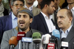 Mohammed Abdul-Salam (L), head of the Houthi delegation to scheduled peace talks in Kuwait, speaks at a news conference at Sanaa Airport, Yemen, April 20, 2016.