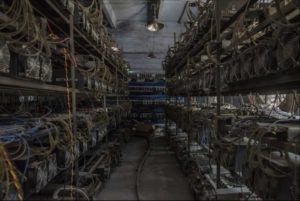 Racks of computers at a server farm mining Bitcoin and Ethereum.