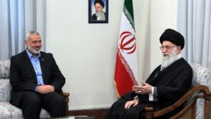Iran's Supreme Leader Ayatollah Ali Khamenei hosts Hamas Prime Minister of Gaza Ismail Haniyeh in Tehran, February 12, 2012 (photo credit: AP)