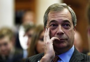 The leader of the United Kingdom Independence Party (UKIP) Nigel Farage listens during a Leave.EU campaign news conference in central London