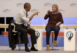 U.S. President Barack Obama speaks with Mai Medhat at the Global Entrepreneurship Summit in Stanford, Calif