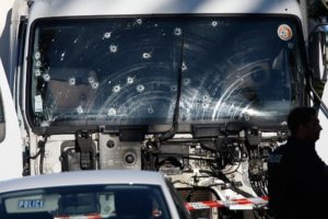 Bullet imacts are seen on the heavy truck the day after it ran into a crowd at high speed killing scores celebrating the Bastille Day July 14 national holiday on the Promenade des Anglais in Nice, France, July 15, 2016. REUTERS/Eric Gaillard - RTSI17P