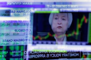Janet Yellen of the Federal Reserve during a June news conference, as reflected in a specialist’s screen on the floor of the New York Stock Exchange. CreditRichard Drew/Associated Press