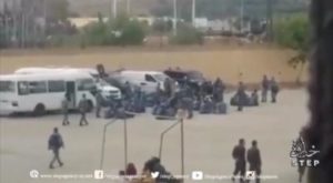 A still image taken from a video uploaded on a social media website shows what it says are government security forces walking outside Hama prison, Syria, May 7, 2016 after a revolt by its inmates. Social Media Website/Handout via Reuters TV