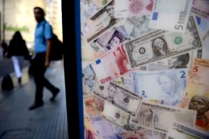 The dollar is currently worth less than 10 Argentine pesos at the official rate, but nearly 15 pesos on the black market (AFP Photo/Eitan Abramovich)