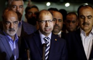 Iraqi parliament speaker Salim al-Jabouri, center, speaks to reporters during a news conference in Baghdad, Iraq, April 13, 2016 (AP)