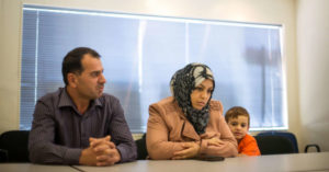 Madiha Algothany and her husband, Mahmoud al-Rifai, and one of their children in Baltimore. Credit Gabriella Demczuk for The New York Times