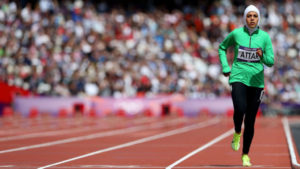 Saudi Arabia's Sarah Attar runs in her women's 800m round 1 heat at the London 2012 Olympic Games at the Olympic Stadium August 8, 2012. REUTERS/Lucy Nicholso