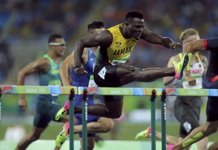 Olympics-Athletics-Clement Wins 400m Hurdles, Culson Left Sobbing