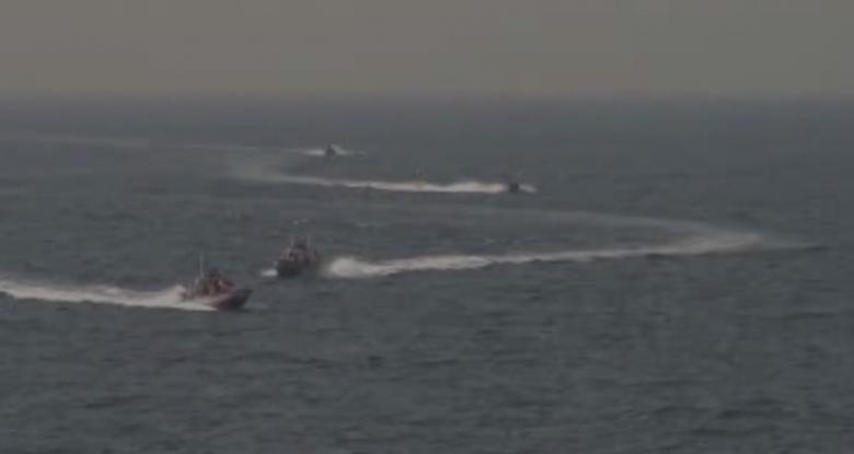 U.S. Navy Ship Fires Warning Shots toward Iranian Vessel