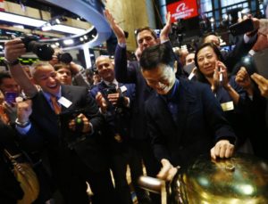 Alibaba Group Holding Ltd founder Jack Ma rings a ceremonial bell to start trading during his company's initial public offering (IPO) under the ticker "BABA" at the New York Stock Exchange in New York September 19, 2014. REUTERS/Brendan McDermid