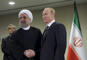 Russia's President Vladimir Putin (R) meets with Iran's President Hassan Rouhani on the sidelines of the United Nations General Assembly in New York, September 28, 2015.Mikhail Klimentyev/RIA Novosti/Kremlin via Reuters