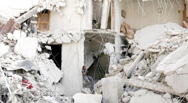 Residential Buildings Are Razed to the Ground in Raids on Aleppo