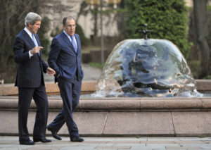 Russia's Foreign Minister Sergei Lavrov, right, and U.S. Secretary of State John Kerry talk during their meeting in Moscow May 7, 2013.