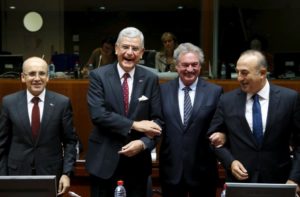 (L-R) Turkey's Deputy Prime Minister Mehmet Simsek, Turkey's EU Affairs Minister Volkan Bozkir, Luxembourg's Foreign Minister Jean Asselborn and Turkey's Foreign Minister Mevlut Cavusoglu pose at the start of a European Union-Turkey accession conference in Brussels, Belgium, December 14, 2015. REUTERS/Francois Lenoir
