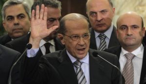 Lebanese head of the Free Patriotic Movement Aoun, accompanied with his parliamentary bloc, speaks during a news conference in Baabda