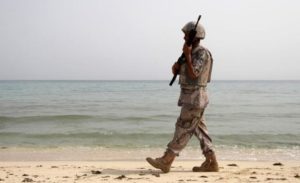 A Saudi border guard patrols near Saudi Arabia's border with Yemen, along a beach on the Red Sea, near Jizan April 8, 2015. REUTERS/Faisal Al Nasser