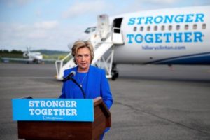 U.S. Democratic presidential candidate Hillary Clinton holds a news conference on the airport tarmac in front of her campaign plane in White Plains