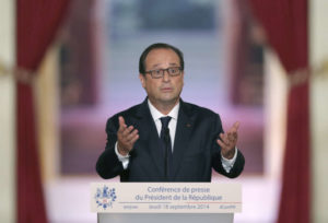 French President Francois Hollande addresses a news conference at the Elysee Palace in Paris