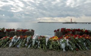 Flowers in memory of passengers and crew members of Russian military Tu-154, which crashed into the Black Sea on its way to Syria on Sunday, are placed at an embankment in the Black Sea resort city of Sochi, Russia, December 26, 2016.
