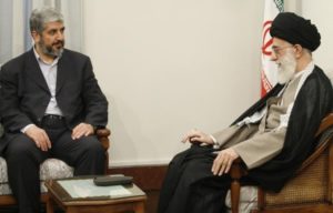 Iran's Supreme Leader Ayatollah Ali Khamenei (R) speaks with Hamas leader Khaled Mashaal during a meeting in Tehran May 27, 2008.