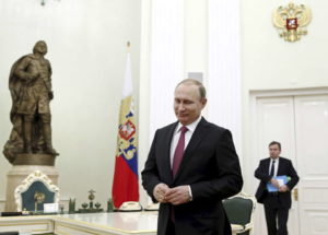 Russia's President Vladimir Putin attends a meeting with Qatar's Emir Sheikh Tamim Bin Hamad Al-Thani in Moscow