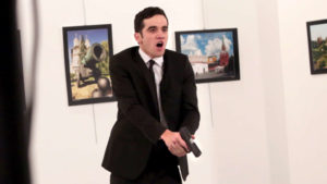 An Associated Press photographer at the scene reports this man shot Andrei Karlov, the Russian ambassador to Turkey, at a photo gallery in Ankara on Monday. (AP)