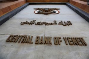 Emblem of the Central Bank of Yemen is seen on the bank's gate in Sanaa