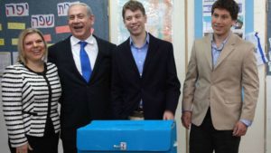 Netanyahu's Family, third wife Sara and sons Yair and Avner, vote in Jerusalem, Jan. 22, 2013.