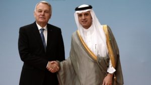 French Foreign Minister Jean-Marc Ayrault shakes hands with Saudi Foreign Minister Adel al-Jubeir. AP