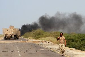 Yemeni forces patrol a main road near Mocha on January 20, 2017.