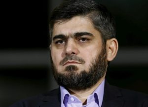 Mohammad Alloush of the Jaish al Islam faction and member of the High Negotiations Committee (HNC) attends a news conference after a meeting with U.N. mediator Staffan de Mistura during Syria Peace talks at the United Nations in Geneva, Switzerland, April 13, 2016. REUTERS/Denis Balibouse/File Photo