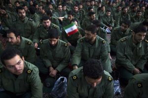 Members of the revolutionary guard (IRGC) attend the anniversary ceremony of Iran's Islamic Revolution at the Khomeini shrine in the Behesht Zahra cemetery, south of Tehran, February 1, 2012.Reuters
