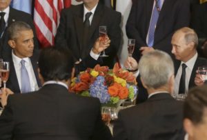 Russian President Vladimir Putin and U.S. President Barack Obama share a toast during the luncheon at the United Nations General Assembly in New York