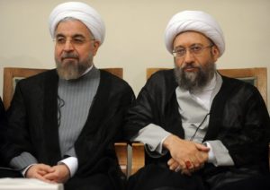 President Hassan Rouhani (L) and Judiciary Chief Sadeq Larijani attending a meeting in Tehran on September 4, 2014. AFP