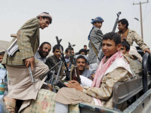 Houthi militants near Sanaa airport. Reuters