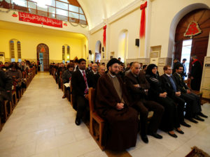 Ammar al-Hakim, leader of the Islamic Supreme Council of Iraq (ISCI), attends a mass on Christmas at Mar George Chaldean Church in Baghdad