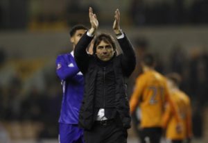 Chelsea manager Antonio Conte applauds fans after the game