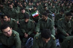 Members of the revolutionary guard attend the anniversary ceremony of Iran's Islamic Revolution at the Khomeini shrine in the Behesht Zahra cemetery