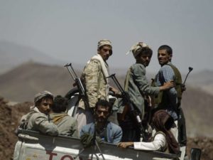Houthi rebels ride on a truck at the compound of the army's First Armored Division in Sanaa September 22, 2014. Khaled Abdullah Ali Al Mahdi