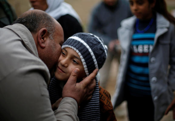 Yazidi Child Reunited with Family after he was Sold by ISIS