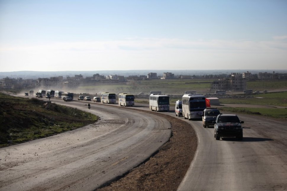 More Syrian Rebels, Families Evacuate Homs under Regime Deal