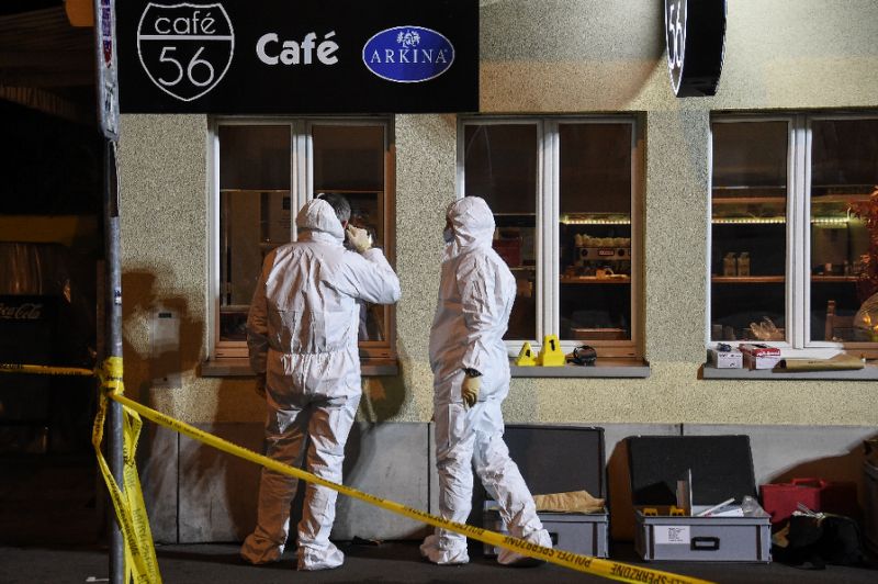 Police Hunt Gunmen who Killed Two in Swiss Cafe