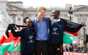 The winners of the London Marathon, Mary Keitany and Wilson Kipsang, both of Kenya, posed with Prince Harry in front of Buckingham Palace on Friday.